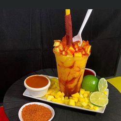 Bombastic Ice Cream Shop - Mango smoothie with mango chunks and homemade Chamoy