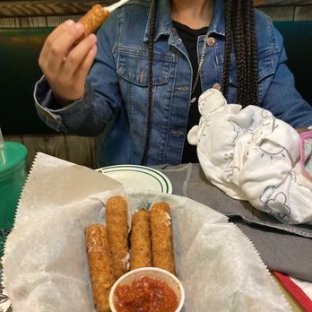 Flanigan's - Pinecrest - My daughter is enjoying the famous Mozzarella Sticks. Yummy - American Near Me - Miami, Florida