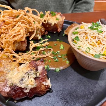 Oak and Barrel - Pork chop w potatoes and BBQ corn - Steakhouses Near Me - Monticello, Indiana
