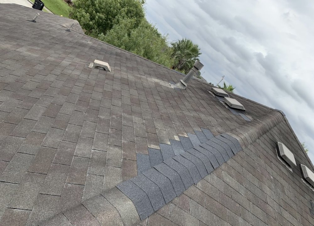 Slide of Redeemer Roofing