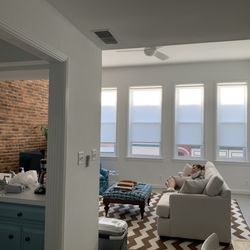 High Style Apartment #5 - The view from kitchen into front room. Those gorgeous windows look out on Main Street.