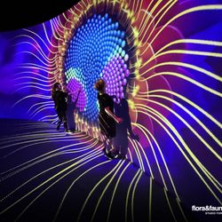 Tacoma Arts Live - Two people enjoy a digital interactive exhibit