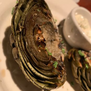 Houston's Restaurant - grilled artichokes with a side of sour cream - American Near Me - Hackensack, New Jersey Houston's Restaurant - grilled artichokes with a side of sour cream - American Near Me - Hackensack, New Jersey