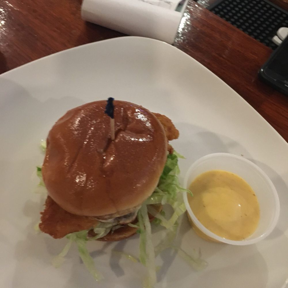 R Park Tavern - a burger with lettuce and a side of mustard - Bars Near Me - Ridley Park, Pennsylvania R Park Tavern - a burger with lettuce and a side of mustard - Bars Near Me - Ridley Park, Pennsylvania