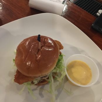 R Park Tavern - a burger with lettuce and a side of mustard - Bars Near Me - Ridley Park, Pennsylvania R Park Tavern - a burger with lettuce and a side of mustard - Bars Near Me - Ridley Park, Pennsylvania
