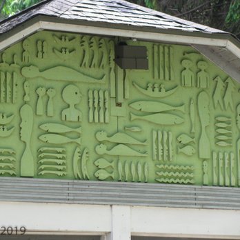Mary Nohl Art Environment - Scroll saw cutouts on the garage gable end. - Art Galleries Near Me - Fox Point, Wisconsin