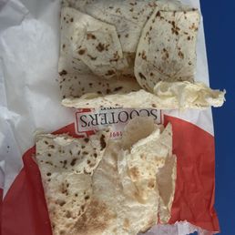 1/4 filled burrito, rest is flat tortilla