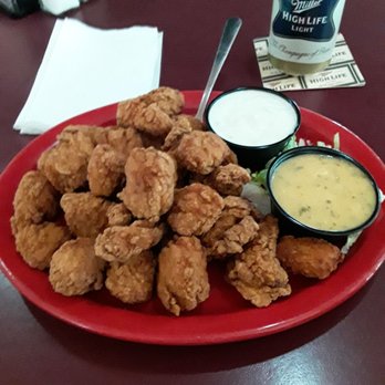 Norm's Eatery and Tap - Boneless Chicken Wings, very dry and way to coated! No Celery, liquidy Blue Cheese Dressing Parmesan Garlic tasted awful. - Sports Bars Near Me - Lyndon Station, Wisconsin