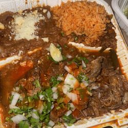 Birria plate. Got shaken up on my drive back  to work but foot was DELICIOUS regardless. Spicy red salsa was a hit