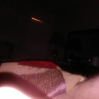 Pizza Hut - a person laying on a bed in the dark - Pizza Near Me - Lufkin, Texas