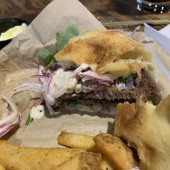 Temblor Brewing Company - Smoked tri-tip sandwich on focaccia bread with french fries - Breweries Near Me - Bakersfield, California Temblor Brewing Company - Smoked tri-tip sandwich on focaccia bread with french fries - Breweries Near Me - Bakersfield, California