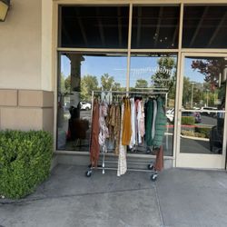 Innovations Salon & Boutique - Clothes rack
