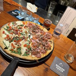 Half carnivore half Rockefeller, medium size gluten-free free crust