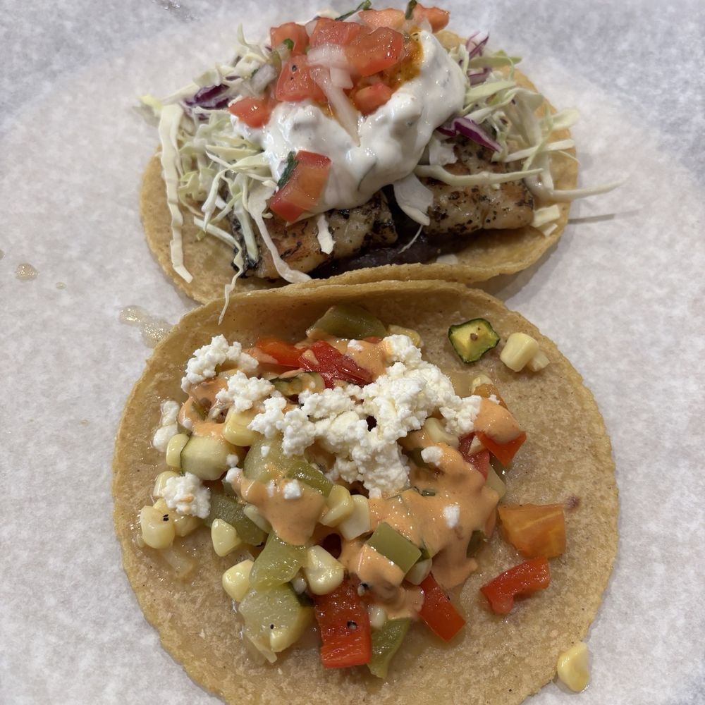 Guisados - Calabasitas (front) and pescado (back) - Tacos Near Me - Burbank, California Guisados - Calabasitas (front) and pescado (back) - Tacos Near Me - Burbank, California