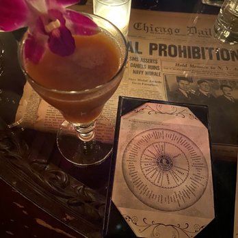 Needle and Thread - Flavor wheel to help you describe your perfect cocktail flavors featuring a spicy, smoky passionfruit margarita with firewater tincture - Lounges Near Me - Seattle, Washington