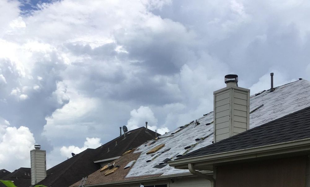 Slide of Johnny's Roofing and storm restoration