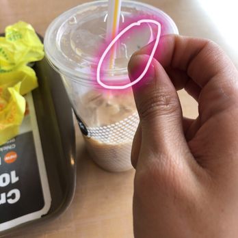 McDonald's - a hand holding a plastic cup with a straw - Burgers Near Me - Pullman, Washington McDonald's - a hand holding a plastic cup with a straw - Burgers Near Me - Pullman, Washington