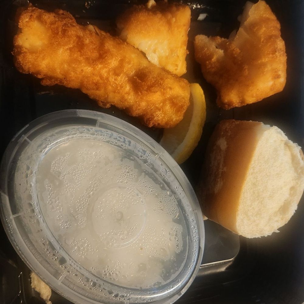 Fried cod fish broken and not full pieces. Fried cod fish broken and not full pieces.