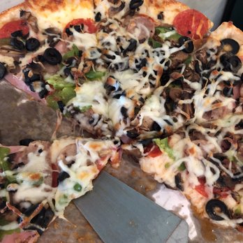 Rossinis Italian Restaurant - Supreme pizza - Italian Near Me - Indian Trail, North Carolina
