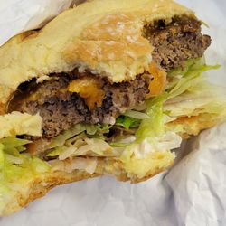 Mr. Growler's - Cheeseburger made with a spongy flavorless patty and a thin slice of cheese