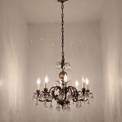 Alchemy Marin - Vintage chandelier in the staircase.