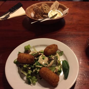 The Pantry - Goat cheese croquettes on salad and bread with herb butter - Modern European Near Me - Amsterdam, New Hampshire The Pantry - Goat cheese croquettes on salad and bread with herb butter - Modern European Near Me - Amsterdam, New Hampshire