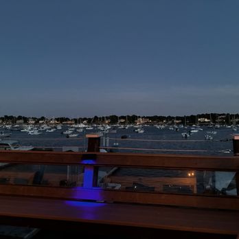 The Landing Restaurant - View from the patio as the summer light dims towards a cool twilight - Seafood Near Me - Marblehead, Massachusetts The Landing Restaurant - View from the patio as the summer light dims towards a cool twilight - Seafood Near Me - Marblehead, Massachusetts