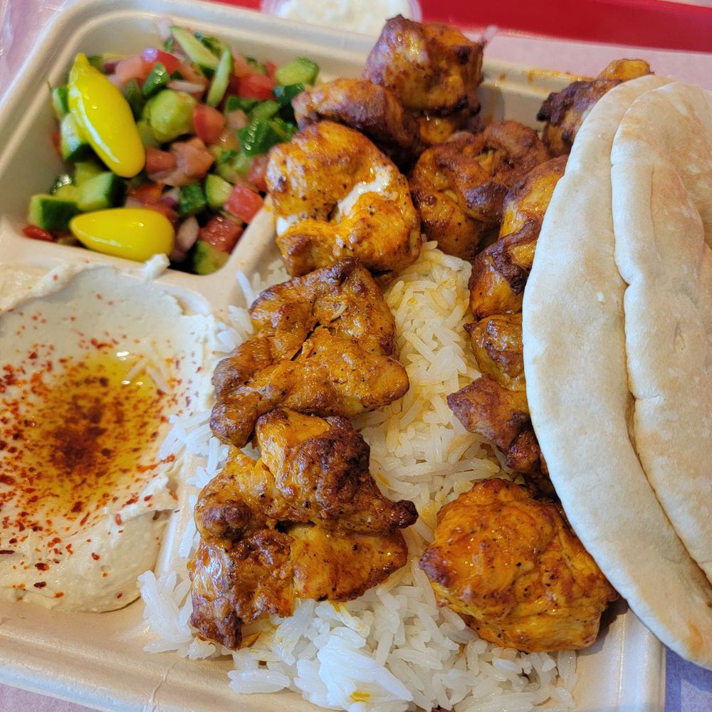 Chicken Kabob Plate (with extra $6 kabob) Yum Garlic Sauce! Chicken Kabob Plate (with extra $6 kabob) Yum Garlic Sauce!