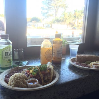 Haggo's Organic Taco - Fish taco plate with organic drinks. Seating inside or outside, facing out. - Tacos Near Me - Encinitas, California Haggo's Organic Taco - Fish taco plate with organic drinks. Seating inside or outside, facing out. - Tacos Near Me - Encinitas, California