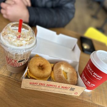 Duck Donuts - a box of doughnuts and a cup of coffee - Donuts Near Me - Hauppauge, New York Duck Donuts - a box of doughnuts and a cup of coffee - Donuts Near Me - Hauppauge, New York