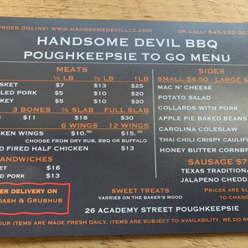 Handsome Devil - To Go Menu. - A printed menu from Handsome Devil BBQ in Poughkeepsie displays prices for various meats, sides, sandwiches, and desserts, with options for delivery via DoorDash and Grubhub. - Barbeque Near Me - Poughkeepsie, New York