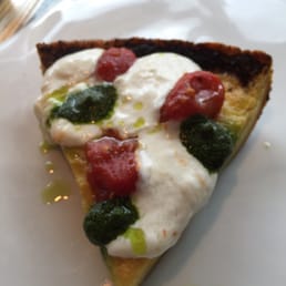 Chick pea pizza - ricotta, cherry tomato and pesto.  Soft and very good flavors.