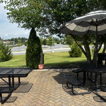 Pumpernickel + Rye - Seating outside in the back and additional outdoor seating on the front patio - Delis Near Me - Urbana, Maryland