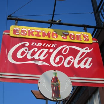 Eskimo Joe's - cool Coke sign on the street - American Near Me - Stillwater, Oklahoma Eskimo Joe's - cool Coke sign on the street - American Near Me - Stillwater, Oklahoma