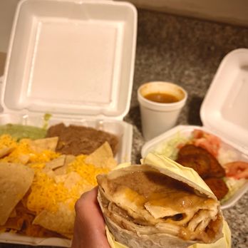 Photo of Al & Bea's Mexican Food - Los Angeles, CA, United States. Bean and cheese burrito w/ green chile plus snack plate & stuffed & fried jalapeño