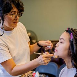 AKI Hair & Makeup artist - Aki doing a bridesmaid's makeup