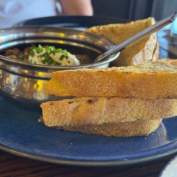 Extra Virgin - MOROCCAN ZAALOUK  wood-roasted tomato & eggplant, fresh herbs, with yogurt & grilled rosemary bread - Tapas/Small Plates Near Me - Kansas City, Missouri