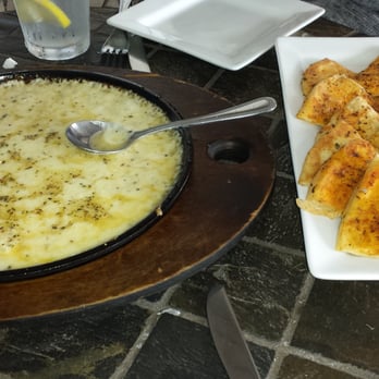 Amphora - The "flaming" saganaki. Delicious, but not flaming as it is upon arrival at other restaurants. - Greek Near Me - Derry, New Hampshire Amphora - The "flaming" saganaki. Delicious, but not flaming as it is upon arrival at other restaurants. - Greek Near Me - Derry, New Hampshire