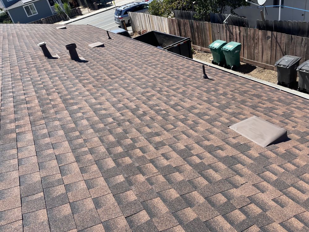 Slide of Fili's Roofing