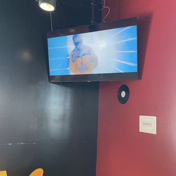 Kiki's Chicken Place - The seating area they have a nice little TV up there - Chicken Shop Near Me - Elk Grove, California