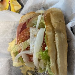 Rino's Italian Grill and Pizza - My Italian sub with a nice pile of chips.