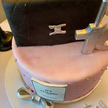 COCOpastel Bakery - a cake with a suitcase on top - Bakeries Near Me - Bronx, New York