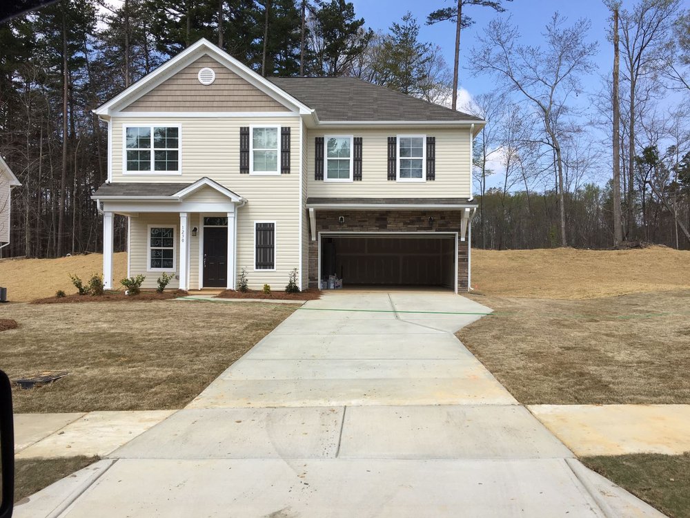 Slide of The Roofing Guy