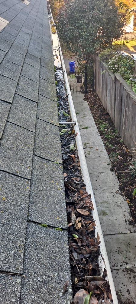 Slide of Mendoza & M  Roofing