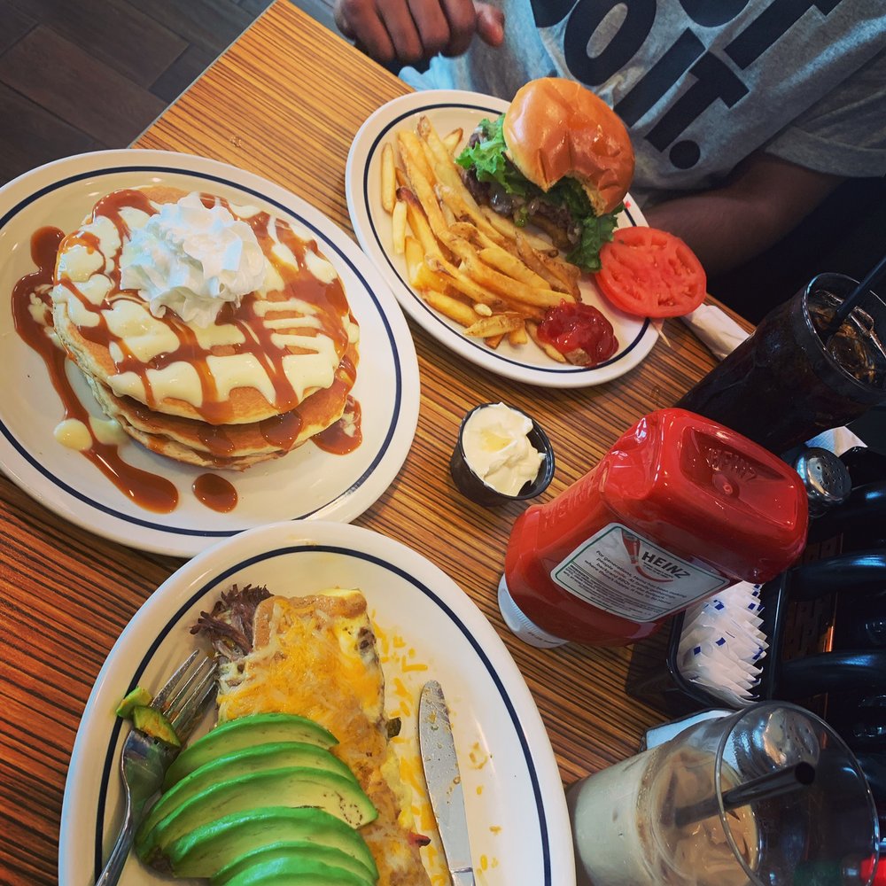 Hubby's Jalapeño kick burger, my Spicy Pablano Omelette  and Tres Leches Pancakes