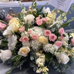 The Flower Market - Asked for contemporary style with butter yellows and light pinks and whites, arranged more so horizontally. Love them!
