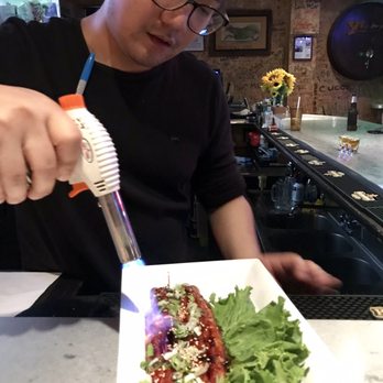 BDG Sports Gastropub - Grilled Eel getting torched by owner/chef - Korean Near Me - Glenview, Illinois BDG Sports Gastropub - Grilled Eel getting torched by owner/chef - Korean Near Me - Glenview, Illinois