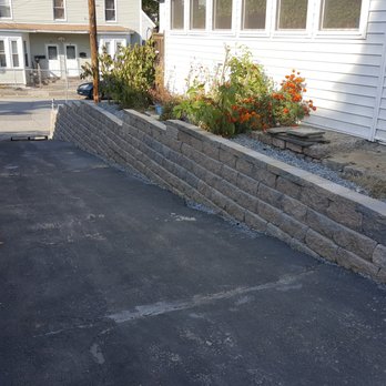 Clearview Lawn and Yard Care - 45' Long, 4' tall. Perfect Retaining wall with caps done in Lawrence, ma. - Landscaping Near Me - North Andover, Massachusetts Clearview Lawn and Yard Care - 45' Long, 4' tall. Perfect Retaining wall with caps done in Lawrence, ma. - Landscaping Near Me - North Andover, Massachusetts