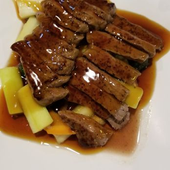 Tokyo - Teriyaki steak on a bed of vegetables - Sushi Bars Near Me - Junction City, Kansas Tokyo - Teriyaki steak on a bed of vegetables - Sushi Bars Near Me - Junction City, Kansas