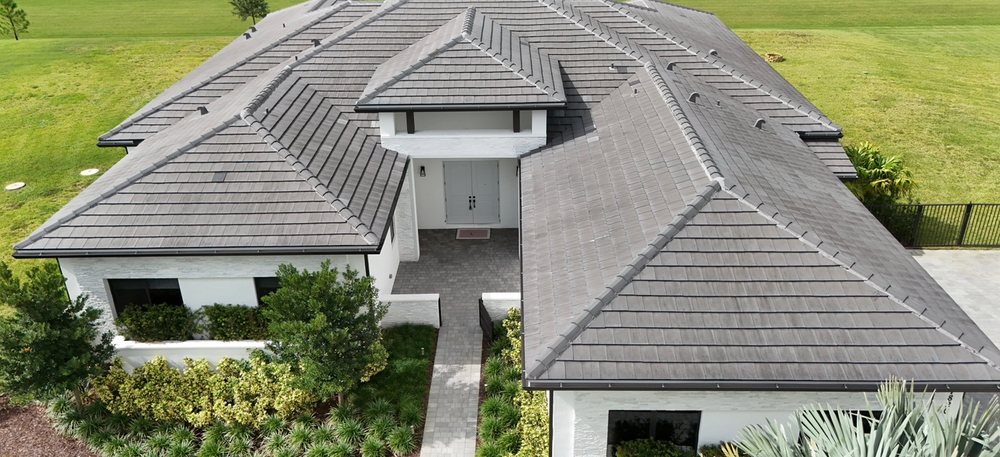 Slide of E&S Roofing